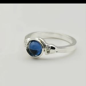 Silver plated blue zircon ring